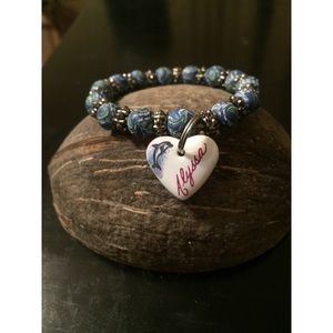 Alyssa bracelet beach theme with dolphin and blue n silver beads